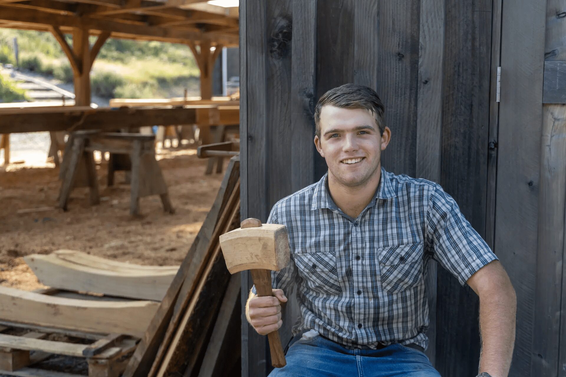 Person holding a hammer